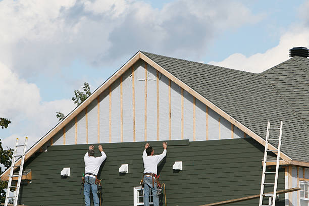 Professional Storm Damage Siding Repair technician working in Burlington, KY
